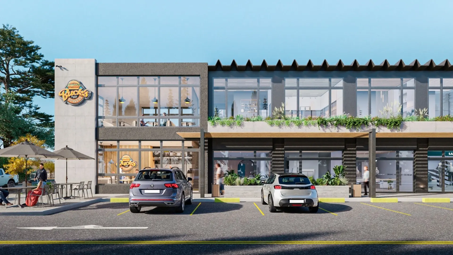 Render del frente de Punto Patricias con autos estacionados